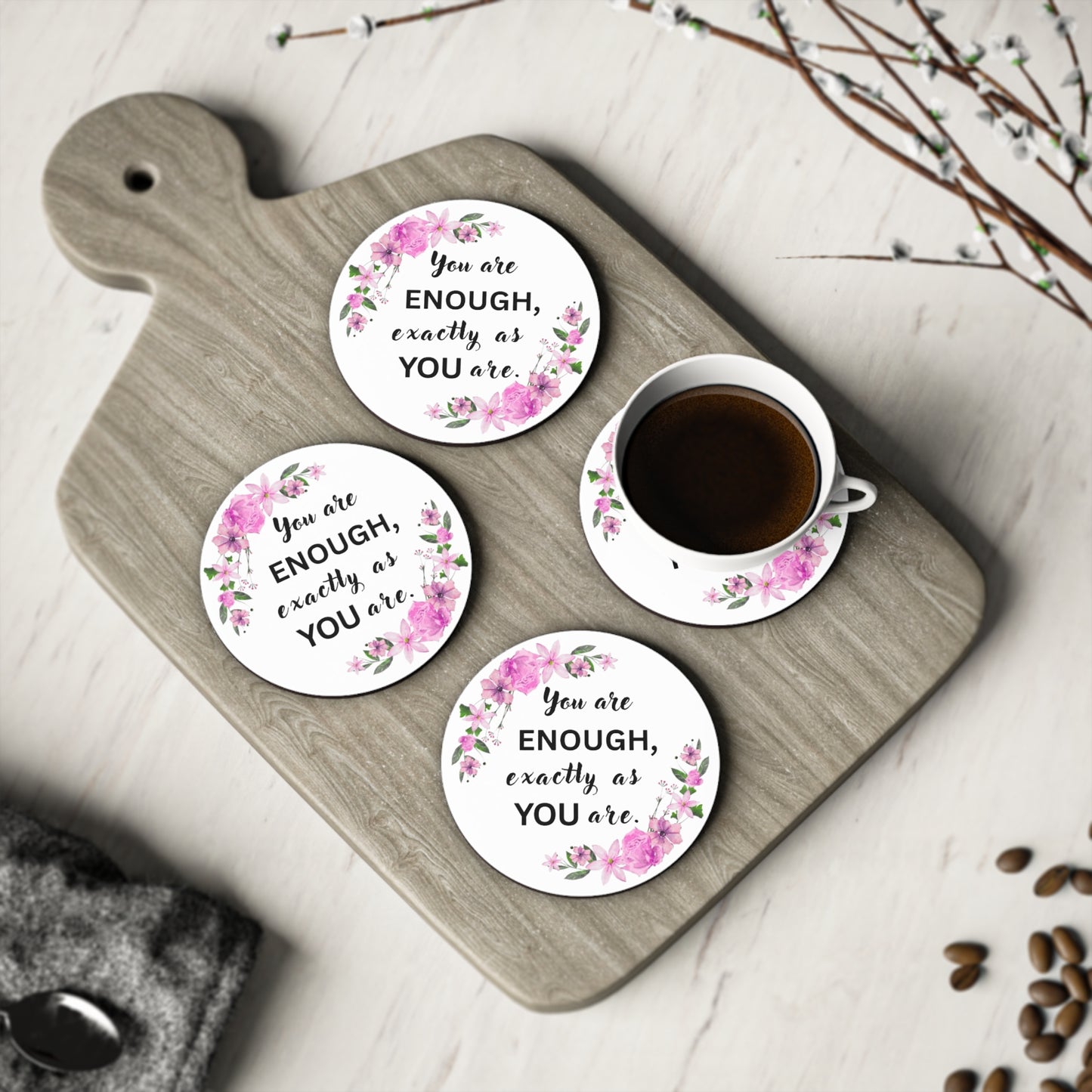 YOU ARE ENOUGH Coasters with motivational quote on a wooden board with a cup of coffee.