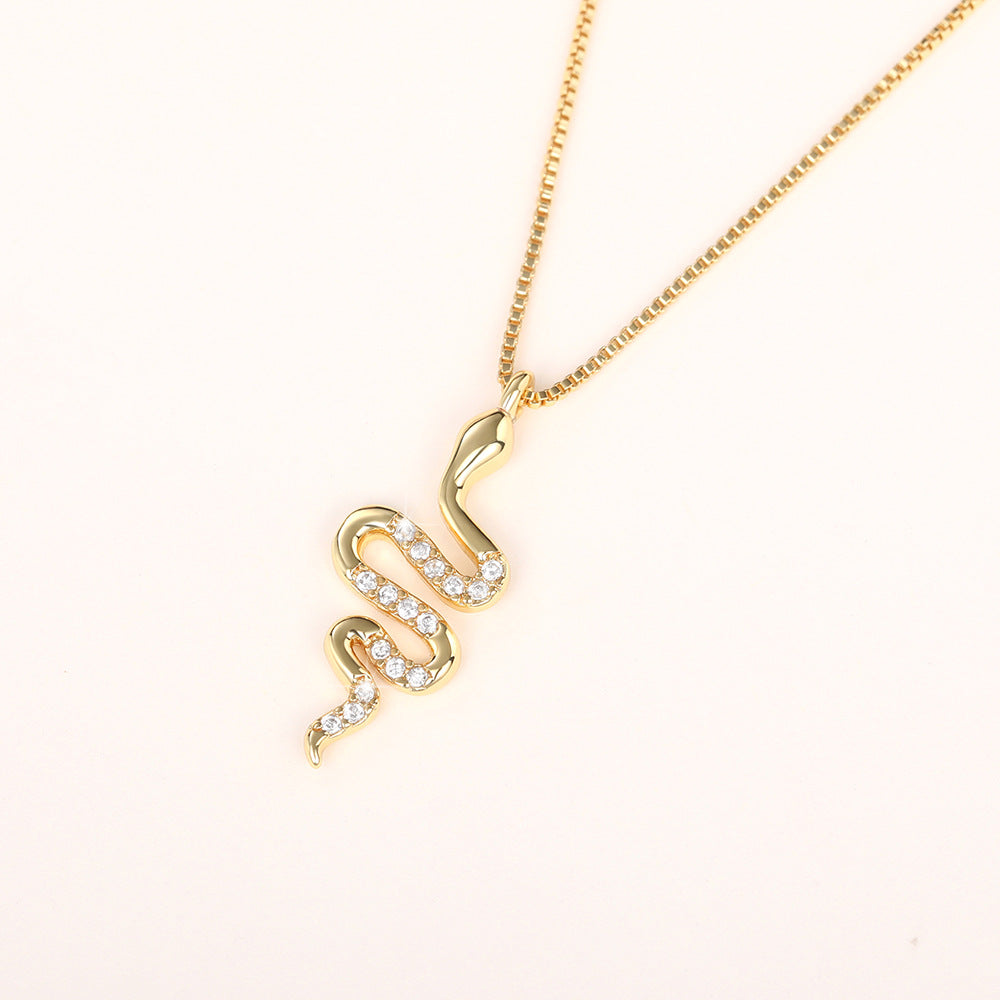 Elegant Snake Pendant Necklace – Dazzling Zirconia Jewelry in White Gold & Gold