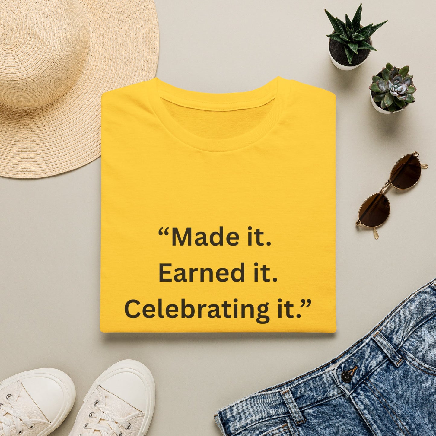 "Made It. Earned It. Celebrating It." — Inspirational Unisex Tee (Black Print)