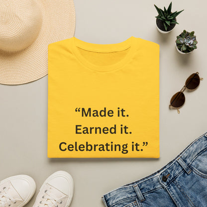 "Made It. Earned It. Celebrating It." — Inspirational Unisex Tee (Black Print)