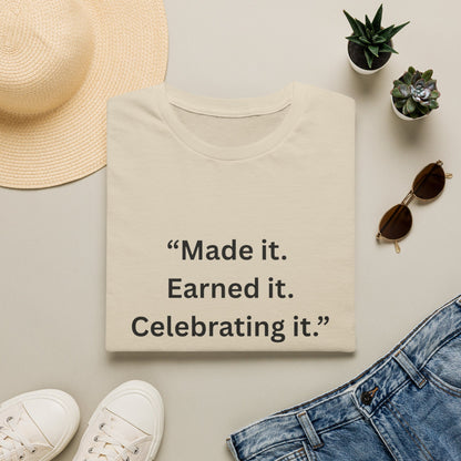 "Made It. Earned It. Celebrating It." — Inspirational Unisex Tee (Black Print)
