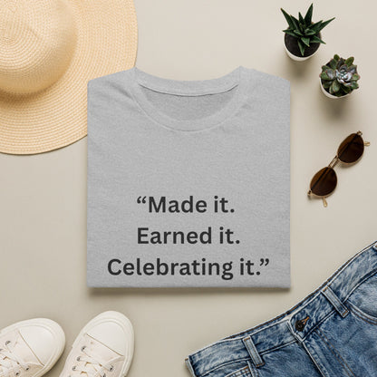 "Made It. Earned It. Celebrating It." — Inspirational Unisex Tee (Black Print)