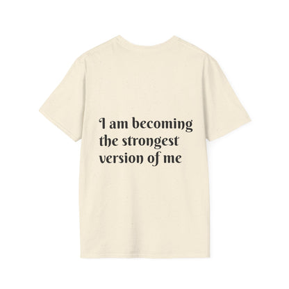 I am becoming the strongest version of me. — Unisex Softstyle T‑Shirt