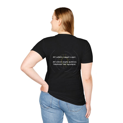 Person wearing a black t-shirt with text on the back, standing against a white background