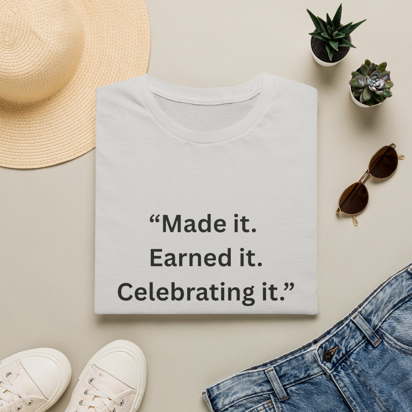 "Made It. Earned It. Celebrating It." — Inspirational Unisex Tee (Black Print)