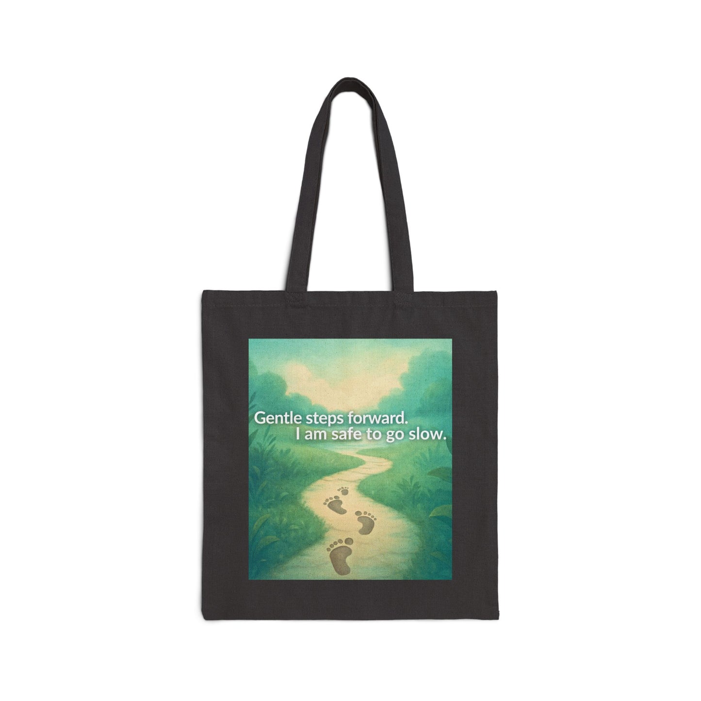 Black tote bag with a nature-themed design and text on a white background