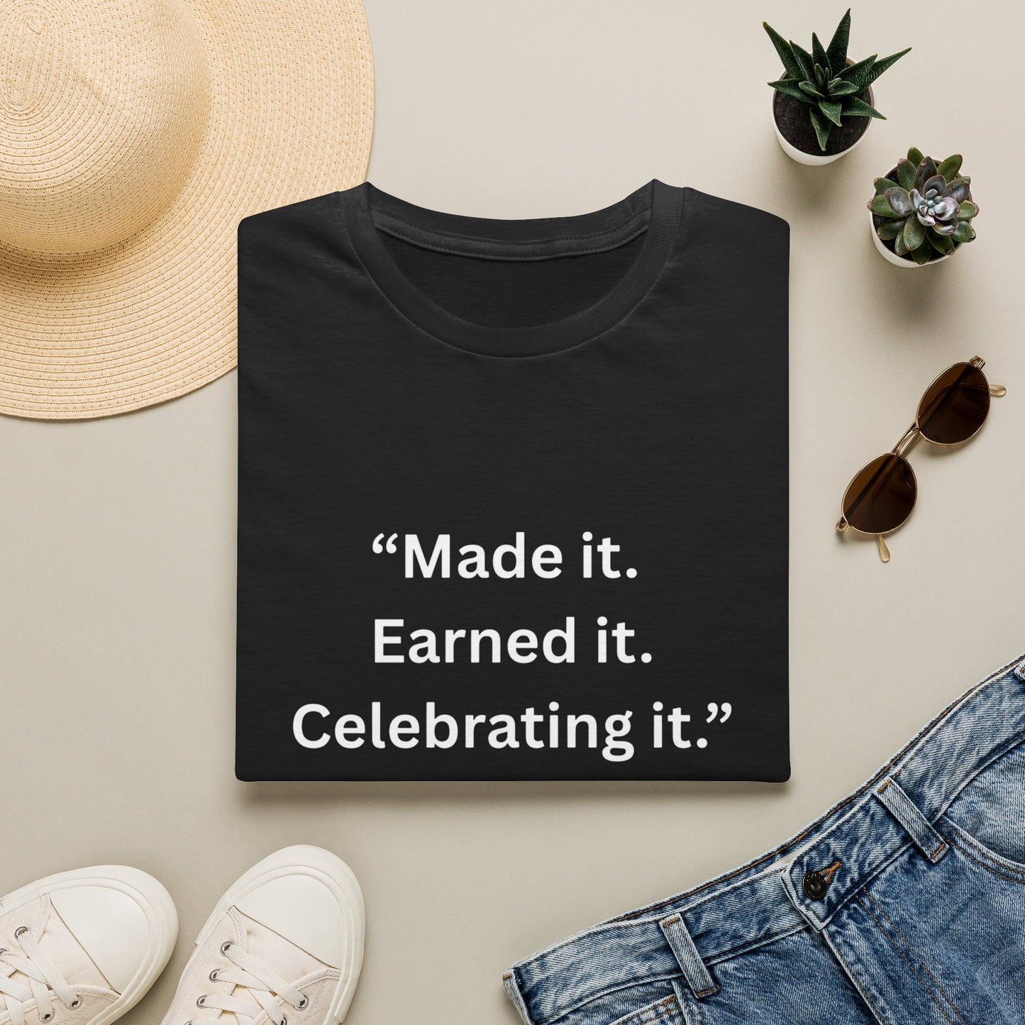 "Made It. Earned It. Celebrating It." — Inspirational Unisex Tee (White Print)