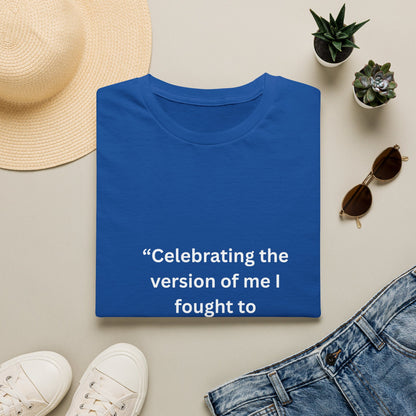 "Celebrating The Version of Me" — Empowered Woman Unisex Softstyle Tee (White Print)