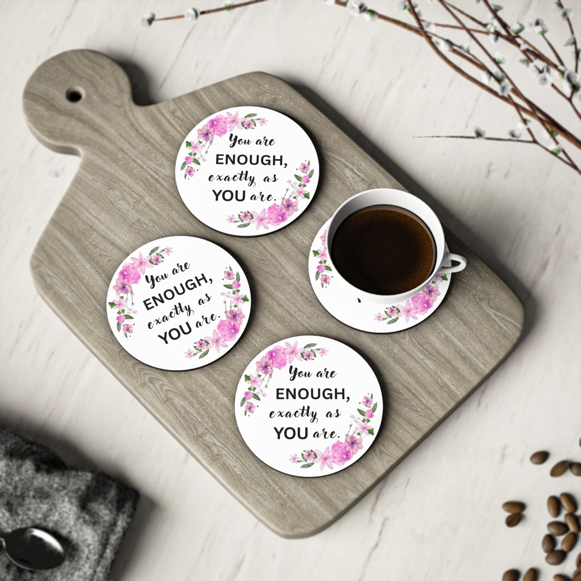 YOU ARE ENOUGH Coasters with motivational quote on a wooden board with a cup of coffee.