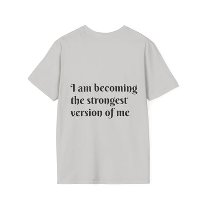 I am becoming the strongest version of me. — Unisex Softstyle T‑Shirt