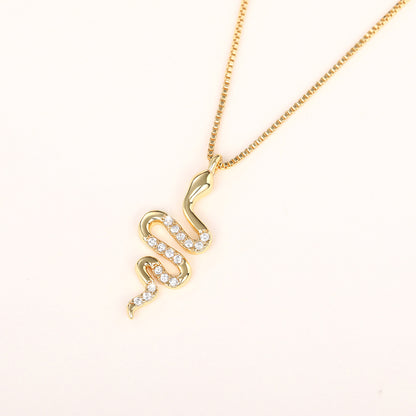 Elegant Snake Pendant Necklace – Dazzling Zirconia Jewelry in White Gold & Gold