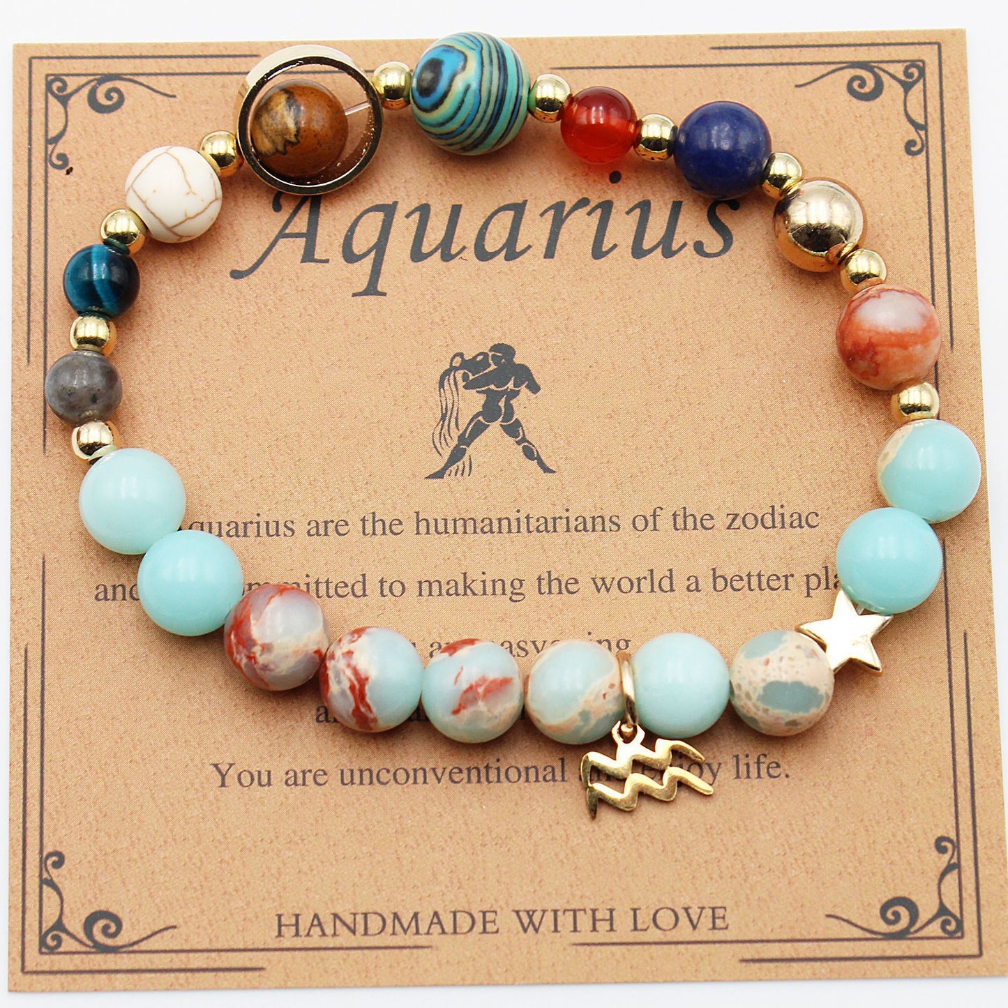 A colorful beaded bracelet representing the Aquarius zodiac sign, displayed on a card with the text 'Aquarius' and a brief description of the Aquarius personality traits. The bracelet is made with a variety of beads and features a gold-tone Aquarius symbol charm.